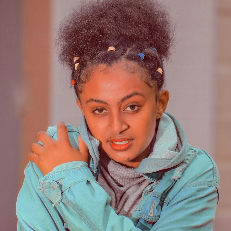 Kaveri Mehta, Lead Design Curator at Lumino Ventura Tech, reviewing corporate floral arrangements